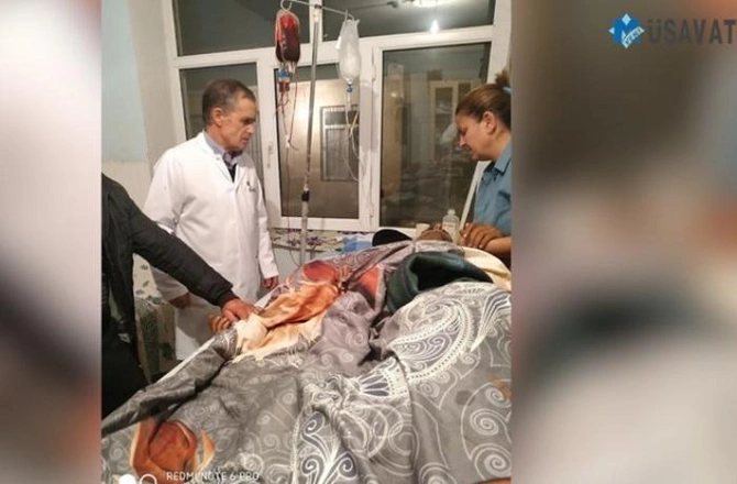 Ali Baş Komandanın şəklini görən yaralı əsgər ayağa qalxıb hərbi salam verdi