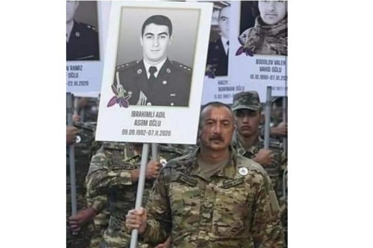 İlham Əliyevin əlində tutduğu plakatdakı şəkil kimindir? — VİDEO