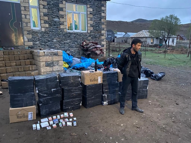 DSX əməliyyat keçirdi, minlərlə qutu siqaret aşkarlandı — FOTOLAR