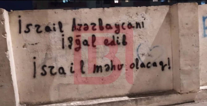 Paytaxtda dini şüarlar yazan 18 yaşlı gənc tutuldu — FOTO