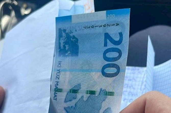 Polis saxta pul paylayan şəxslə bağlı müraciət etdi — FOTOLAR Polis saxta pul paylayan şəxslə bağlı müraciət etdi — FOTOLAR