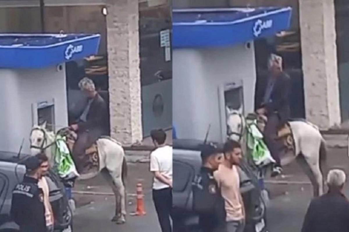 Azərbaycanda qəribə hadisə — Bankomatdan pul çıxarmağa atla getdi (VİDEO)