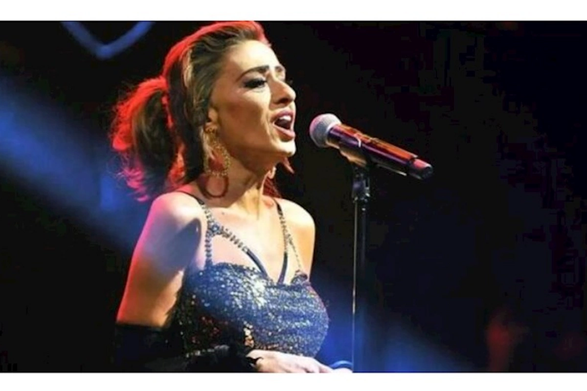 Məşhur müğənni məzarın üstünə çıxıb mahnı oxumaq istədi — FOTO