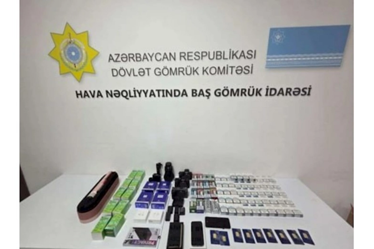 Telefonun içərisində gömrükdən qızıl külçələr keçirmək istədilər — FOTOLAR