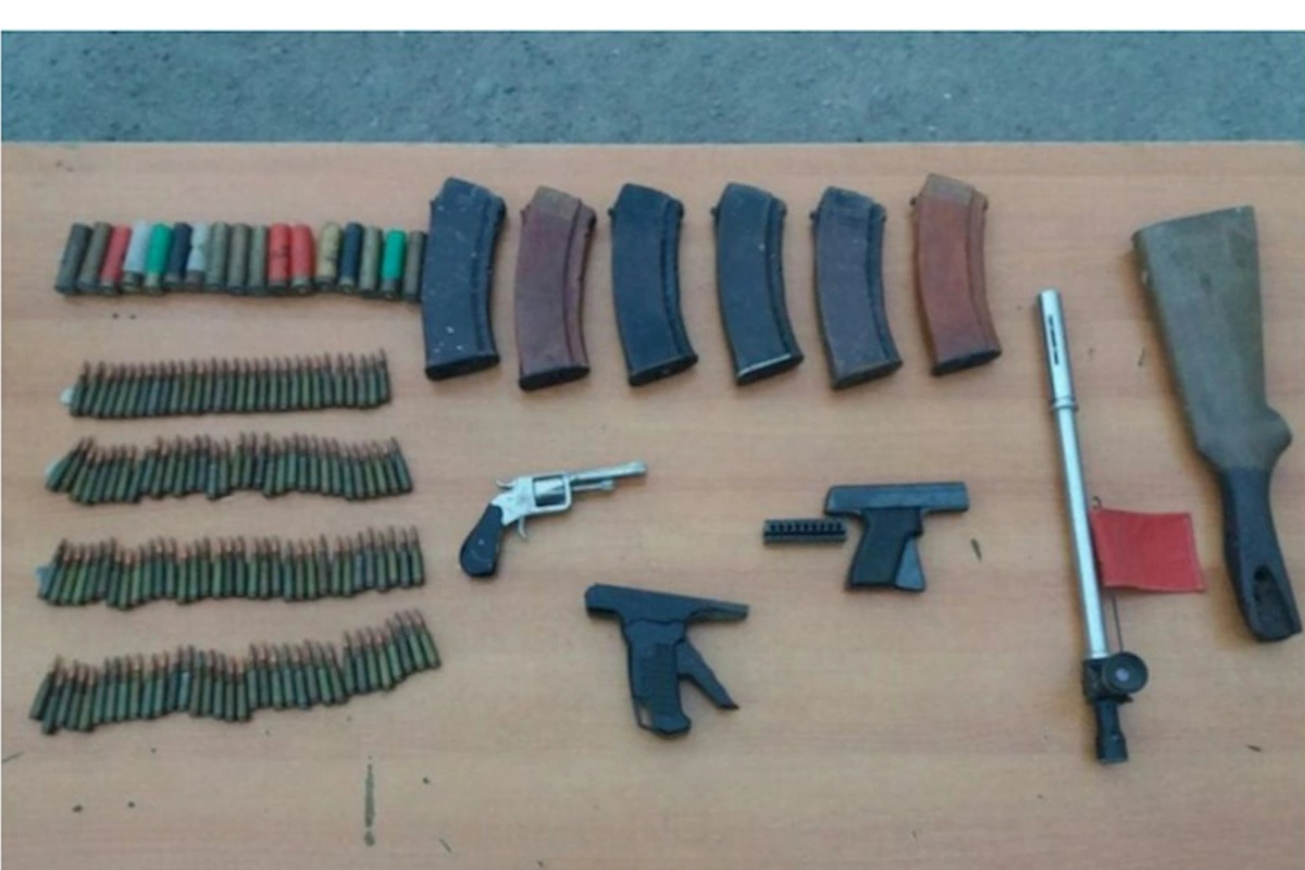 Polis xeyli sayda silah-sursat aşkarladı