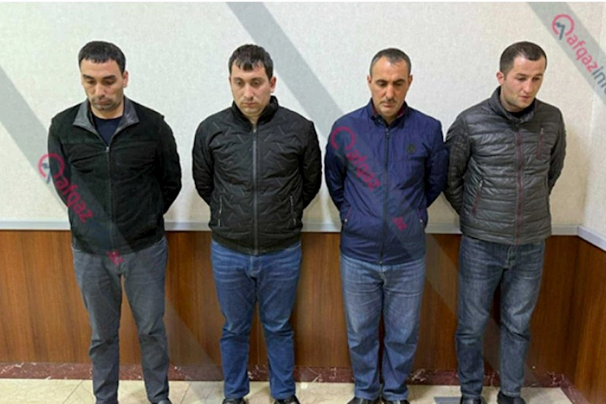 O maşını əzib sürücünü döyənlər həbs olundu