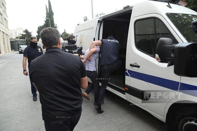 Sputnik Azərbaycanda saxlanılan iki nəfər binadan çıxarılıb — FOTOLAR