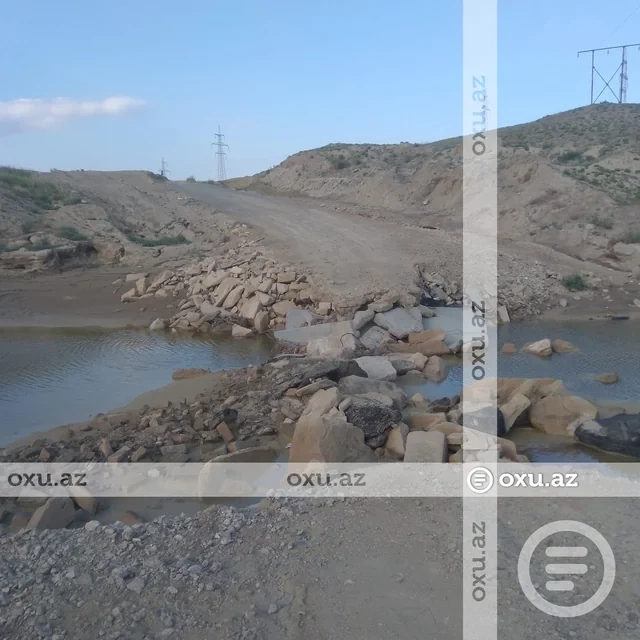 Bakıda bir qəsəbəyə çəkilən alternativ yolu da sel apardı — VİDEO/FOTOLAR