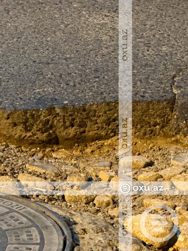 Bakıda çökən yol sürücüyə 800 manata başa gəldi — VİDE/FOTO