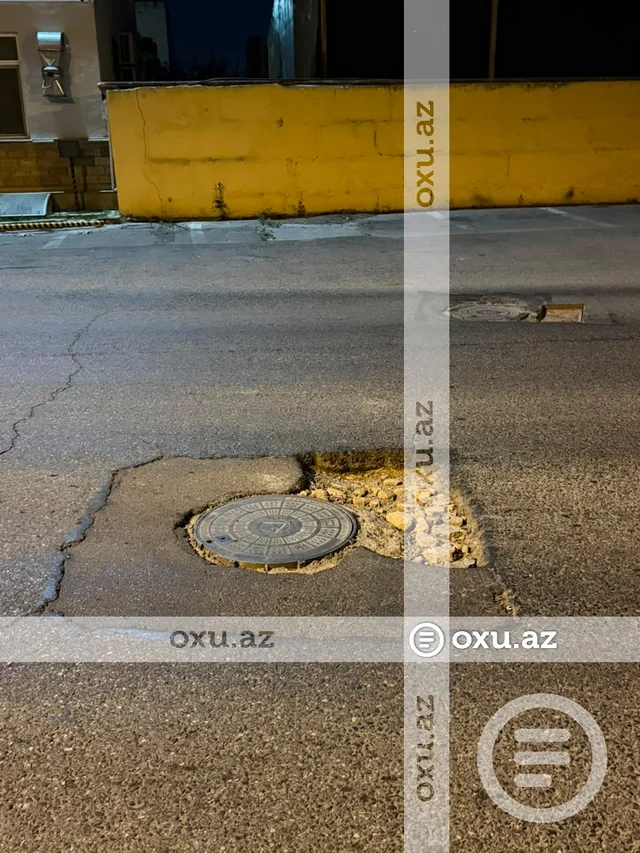 Bakıda çökən yol sürücüyə 800 manata başa gəldi — VİDE/FOTO