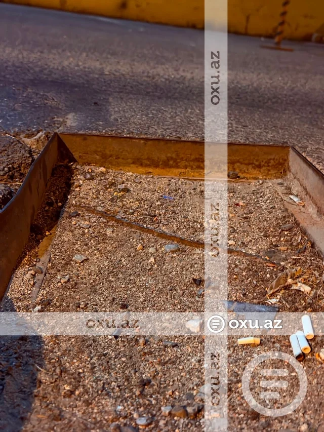 Bakıda çökən yol sürücüyə 800 manata başa gəldi — VİDE/FOTO