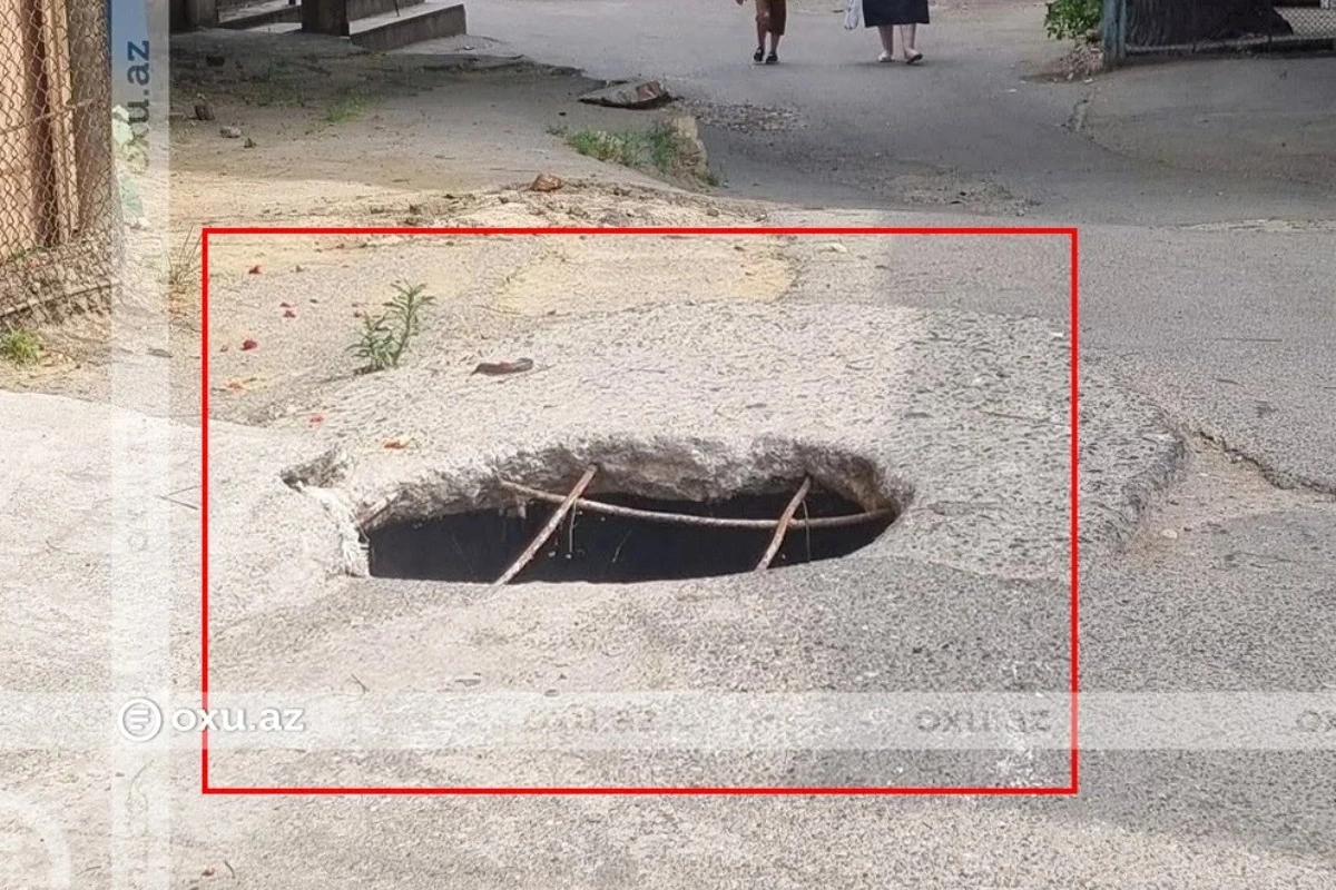 Yaşayış məntəqəsində təhlükəli vəziyyət: Yolun ortasında dərin çuxur var