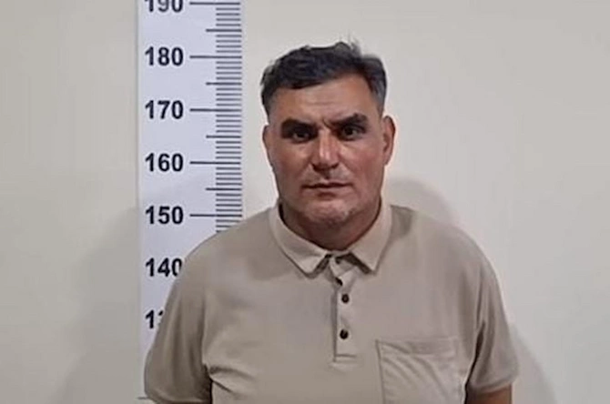 Yandırılaraq öldürülən ər-arvadın fotosu