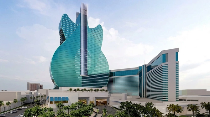 Gitara formalı bina tikilir Gitara formalı bina tikilir